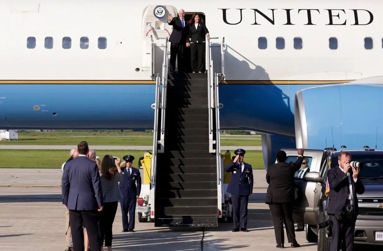 Then Vice President Mike Pence and Mrs. Karen Pence exiting the airplane
